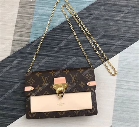 vavin nv pm louis vuitton|Louis Vuitton vavin chain wallet.